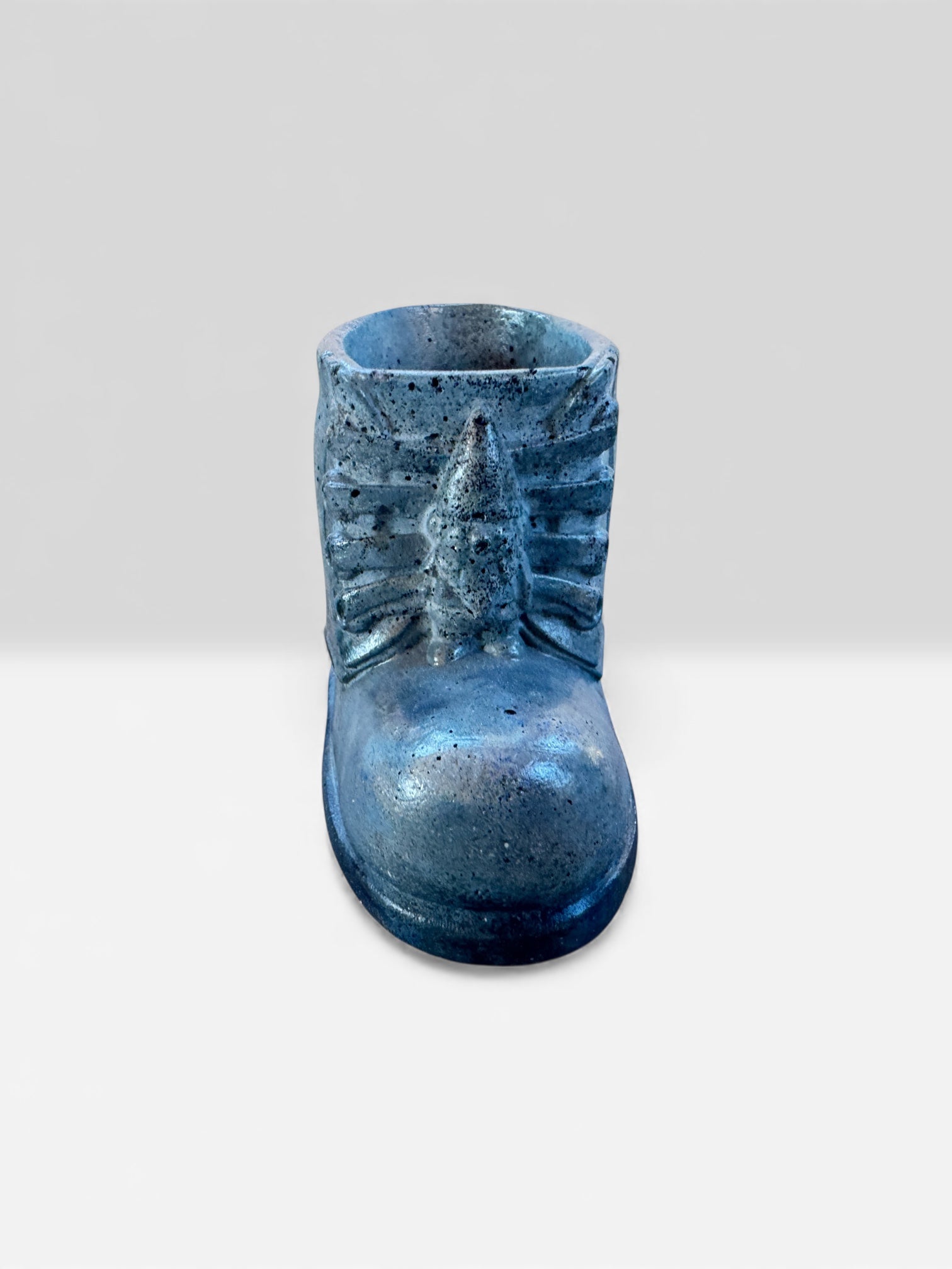 Decorative denim blue concrete boot for shelf or windowsill