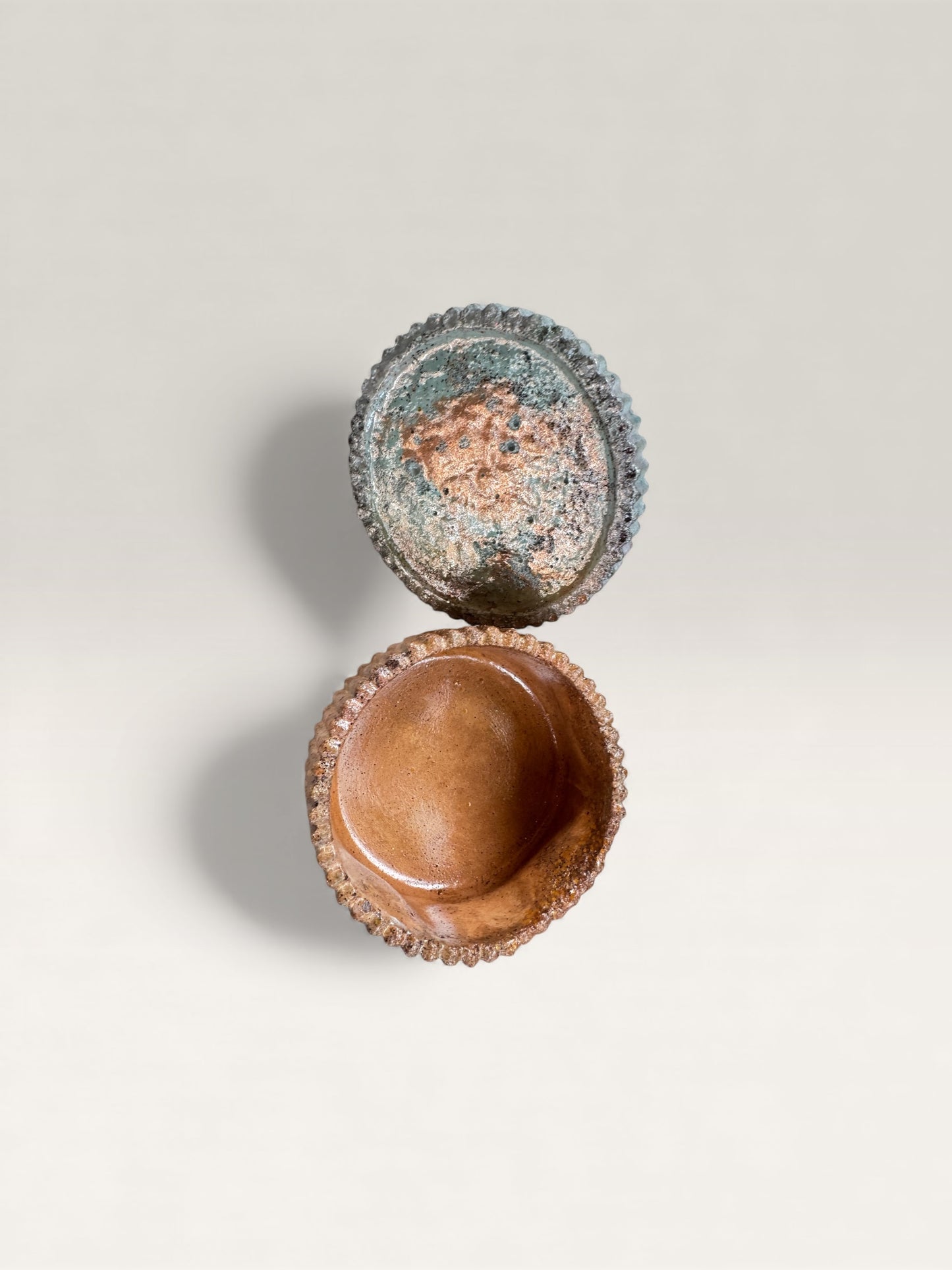 Frosted Ember Blue & Copper Concrete Jar with Lid - Artistic angle
