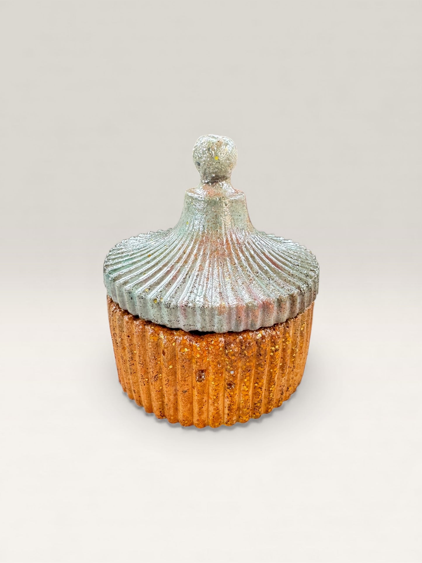 Frosted Ember Blue & Copper Concrete Jar with Lid - Styled on shelf
