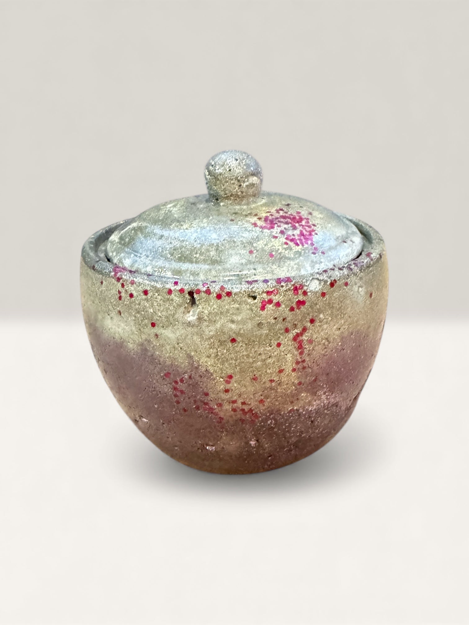 One-of-a-kind dusty rose concrete container