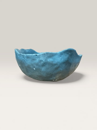 Organic shape soft blue concrete bowl