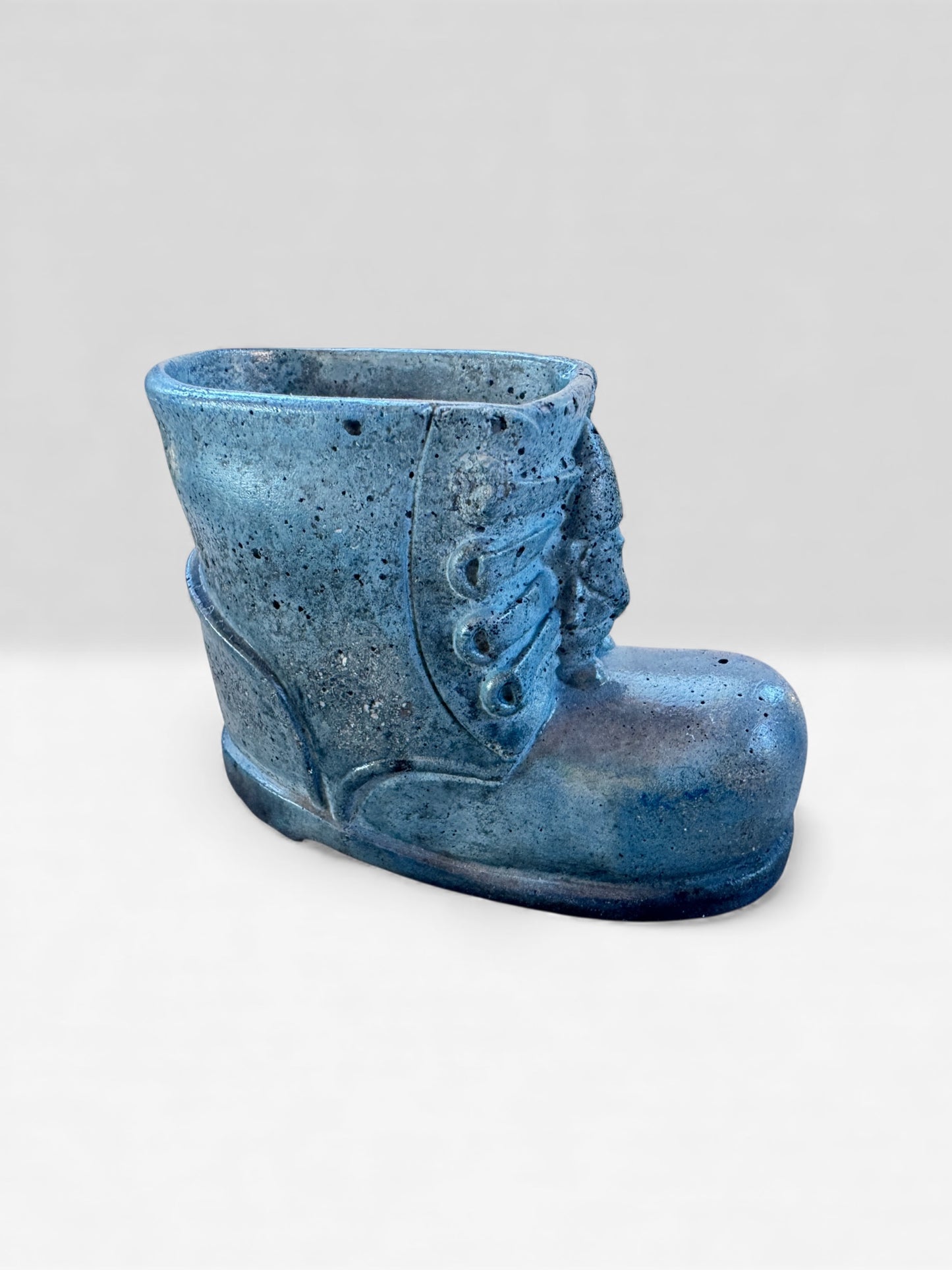 Winter-themed concrete plant pot with satin stone-like surface