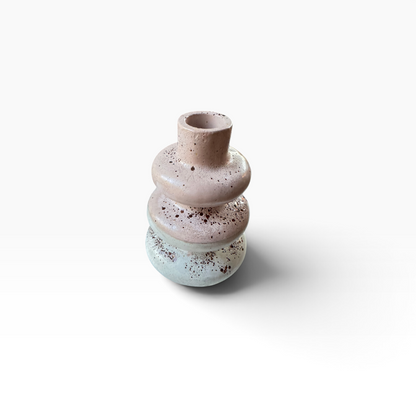Terra Bubble Vase in terracotta beige and gray concrete with organic dark speckles, angled product view
