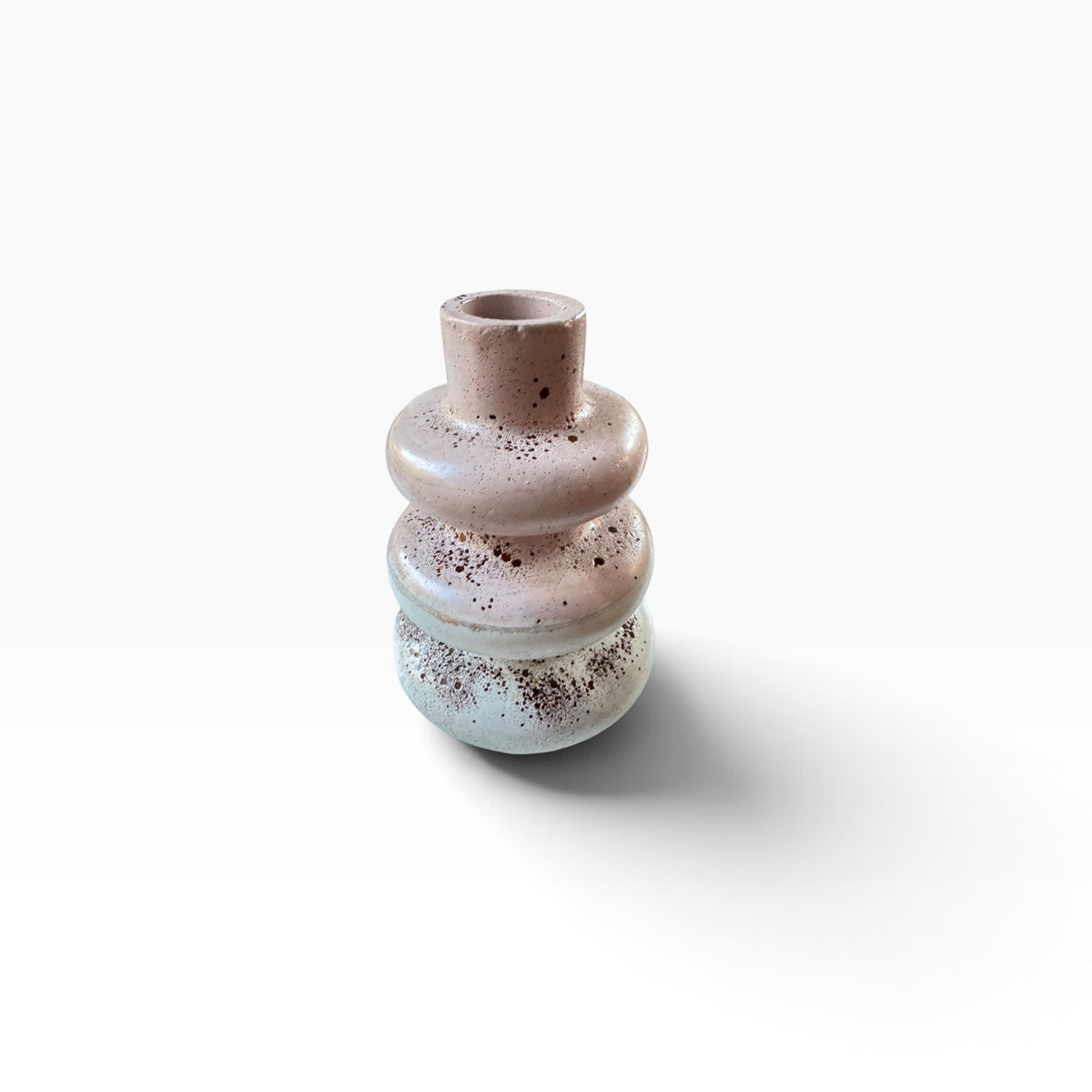Front angled view of the handmade Terra Bubble Vase in sealed speckled concrete