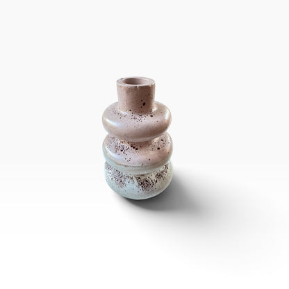 Front angled view of the handmade Terra Bubble Vase in sealed speckled concrete