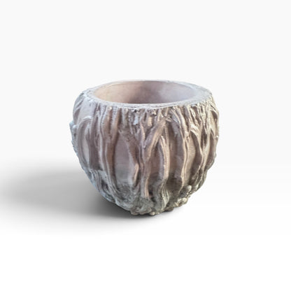 Back view of Terra Raven Skull Planter showing twisted woodland relief
